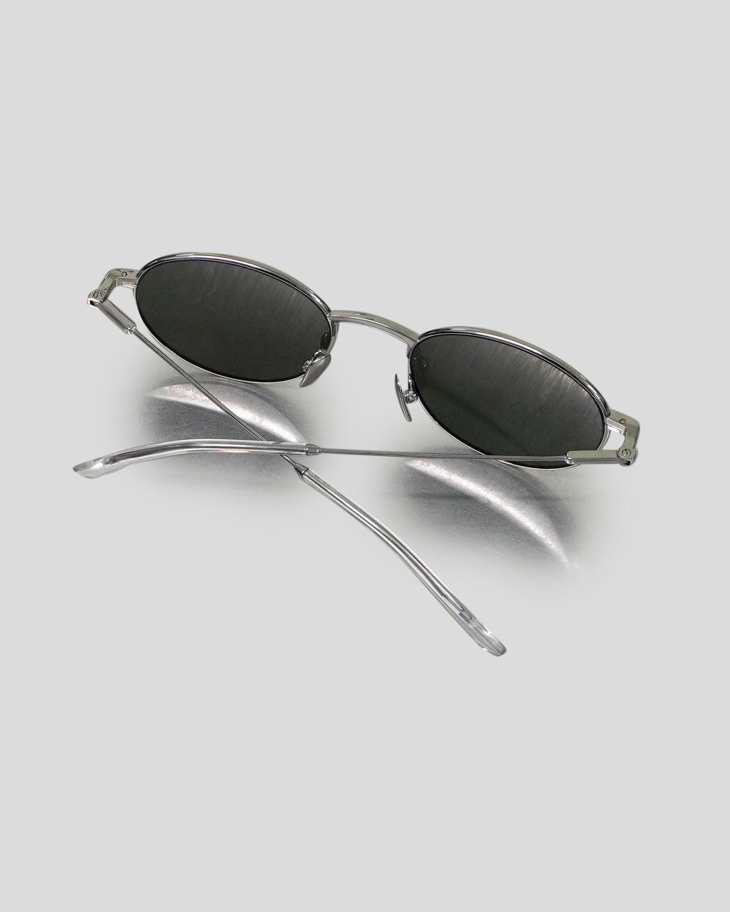 The Cruz with Silver Frame & Green Lens